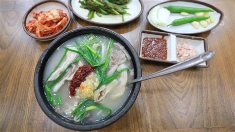   Dwaeji Gukbap: A Soul-Warming Broth Brimming with Savory Pork and Tender Noodles