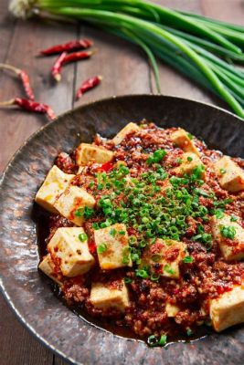  Spicy Mapo Tofu: A Symphony of Silken Tofu and Fiery Sichuan Peppers, Will Your Taste Buds Dare to Embark on This Flavorful Journey?